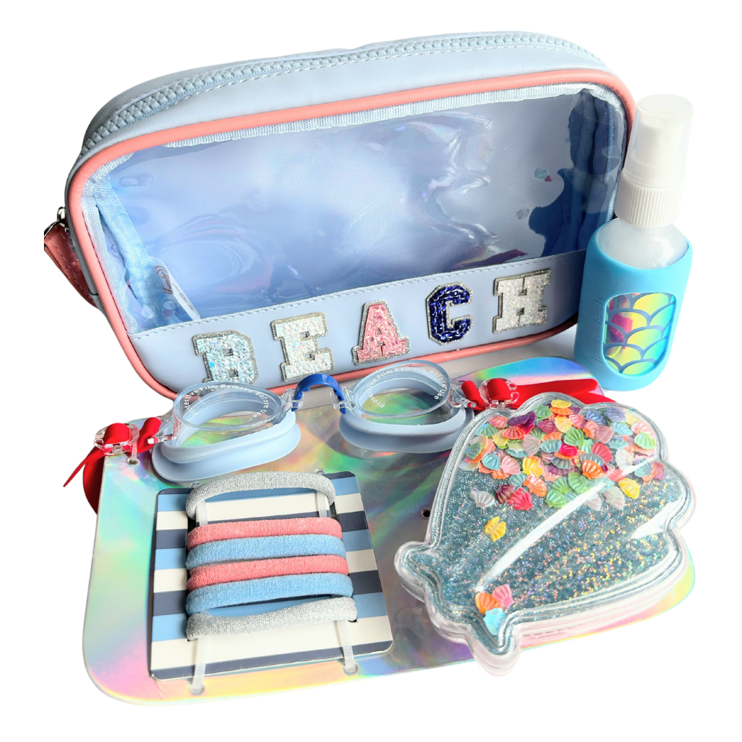 Beach gift bundle filled with kids travel essentials, wellness products, and summer accessories.