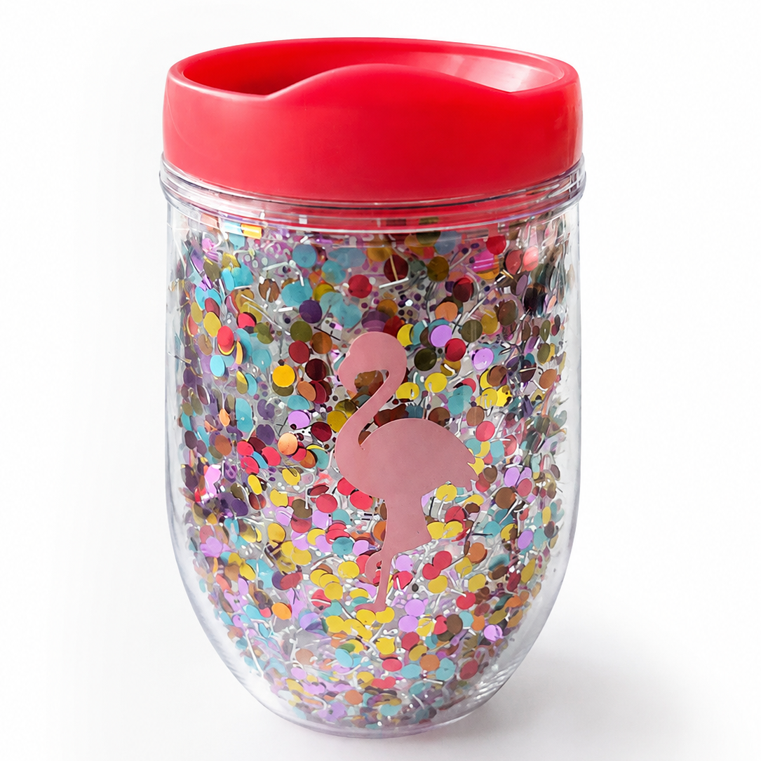 Flamingo confetti tumbler with pink lid and colorful floating confetti