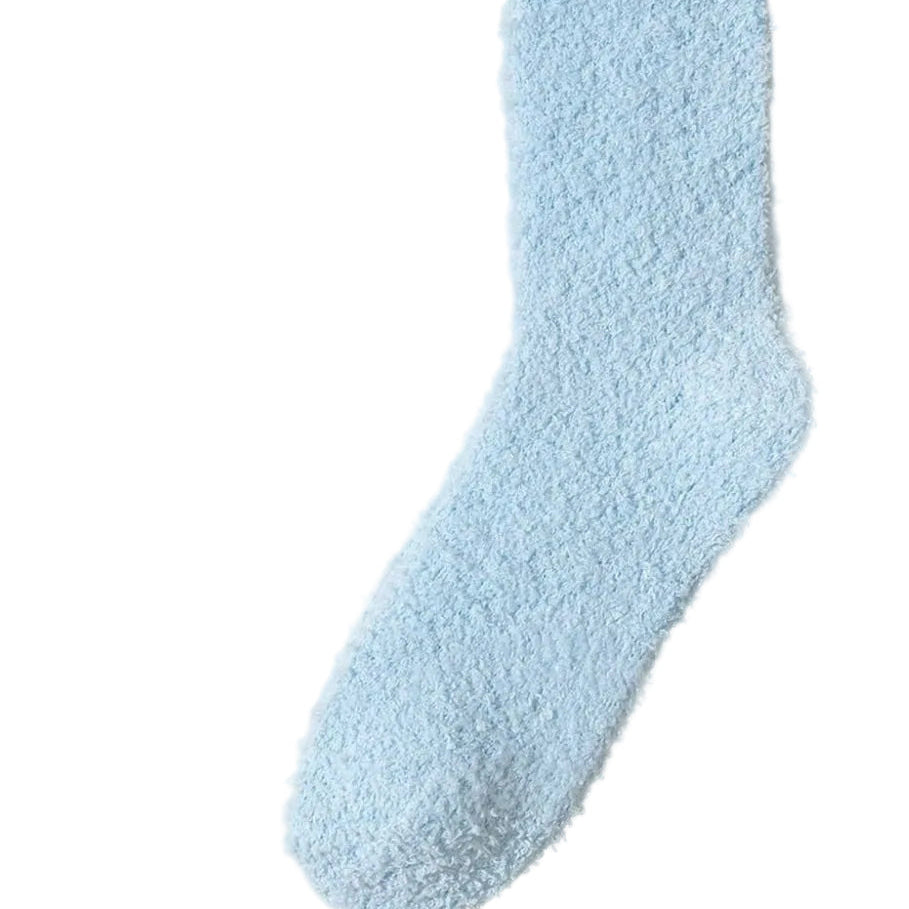 Soft blue cozy socks featured in a wellness-inspired graduation gift bundle by Vinyl & Oil.
