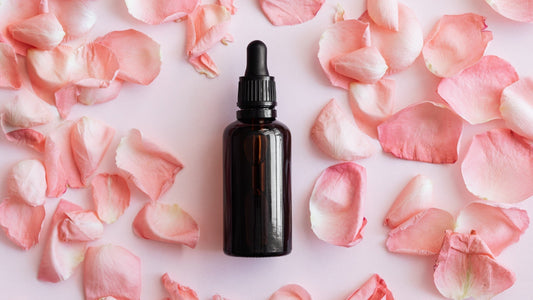 rose-essential-oil-skincare-wellness-flatlay.jpg