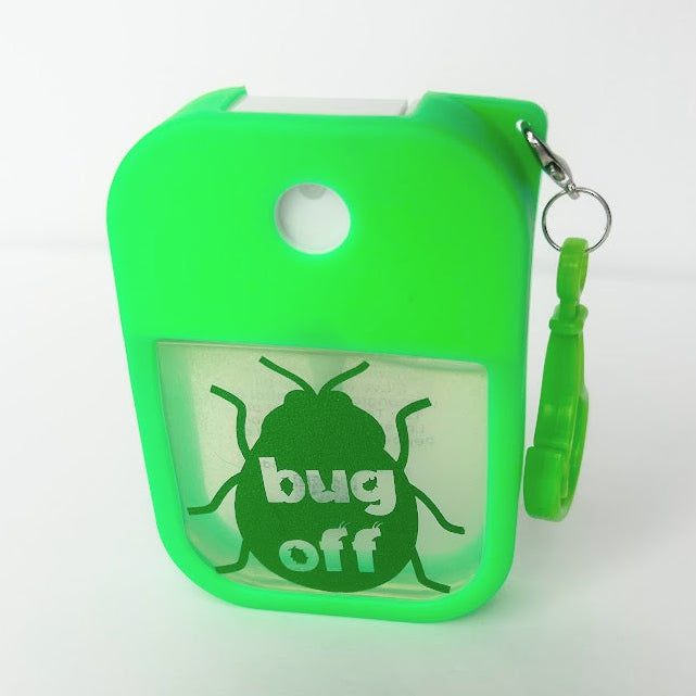 Bug Off Travel Spray made with essential oils in a refillable travel bottle for camping, hiking, sports, and outdoor adventures.