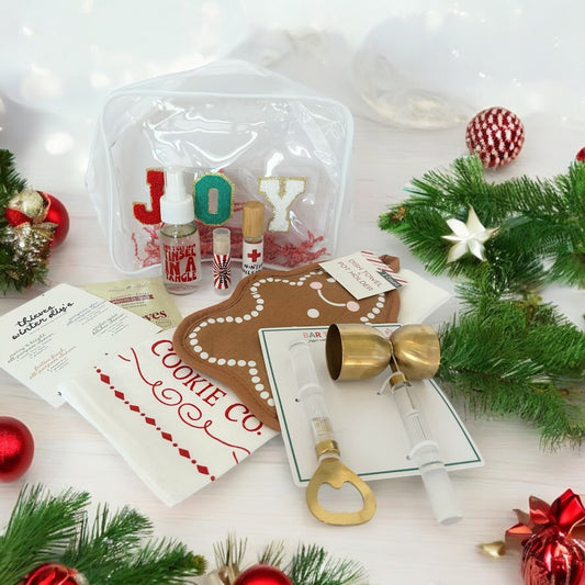 Christmas wellness gift bundle with reusable JOY bag, seasonal wellness products, kitchen accessories and bar tools.