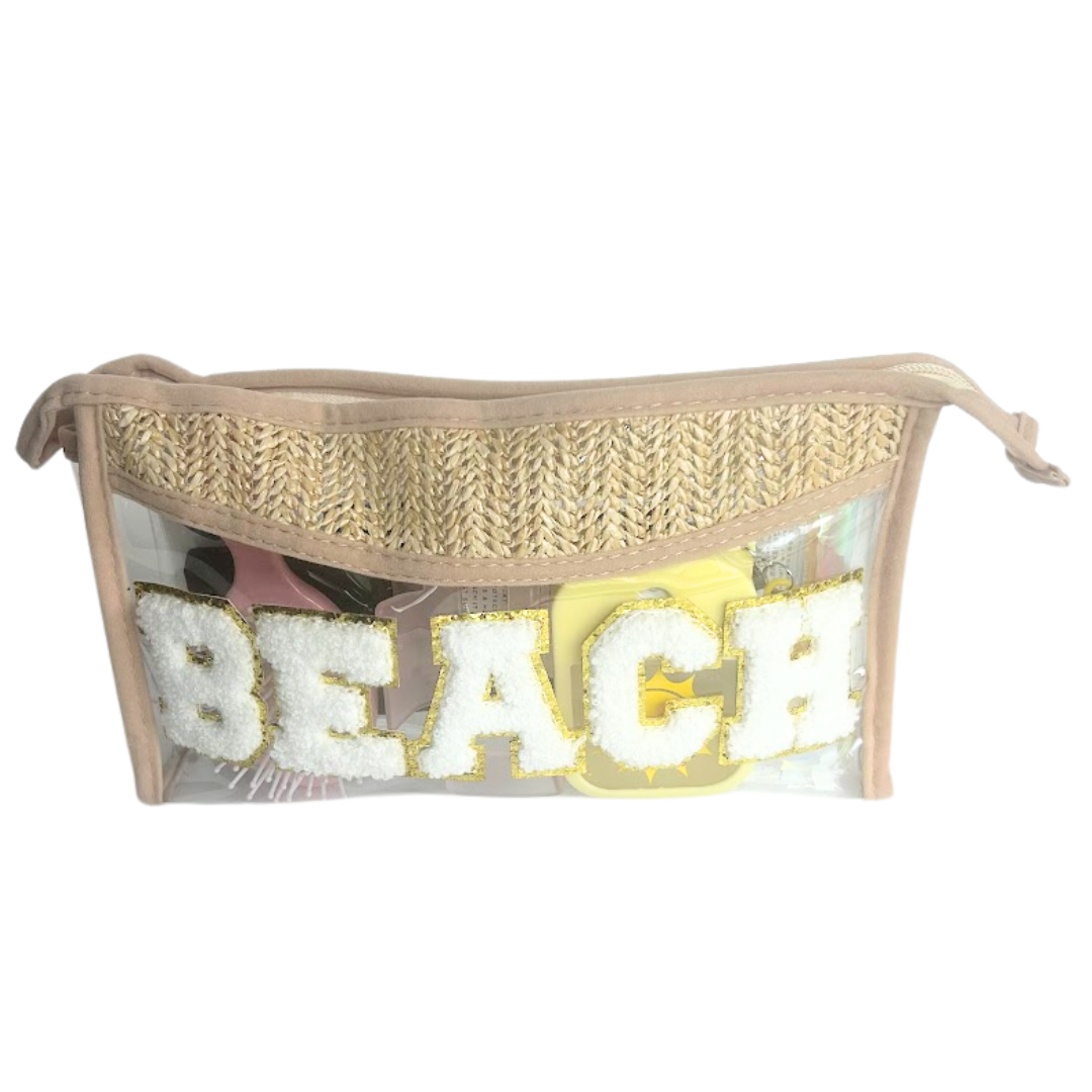 Clear straw cosmetic bag personalized with white chenille BEACH letters and filled with gift items
