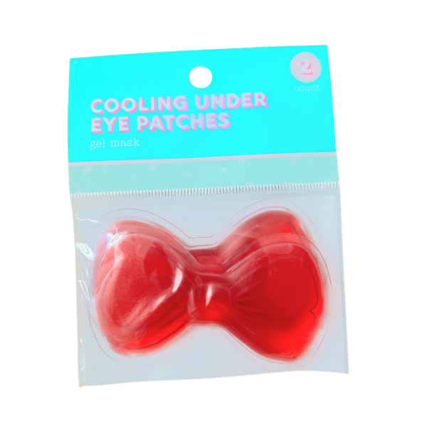 Cooling under-eye gel patches in a red bow shape for reducing puffiness and refreshing tired eyes. Reusable gel eye mask for self-care, spa gifts, travel, and wellness gift bundles.