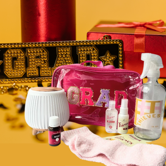 Graduation wellness gift bundle with diffuser, essential oils, wellness spray, cozy socks, and reusable grad pouch for high school or college graduates.