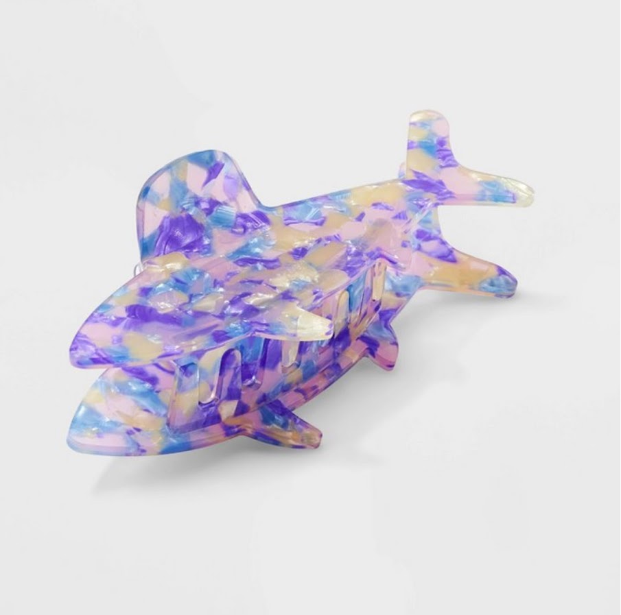 Colorful butterfly-shaped hair clip on a white background