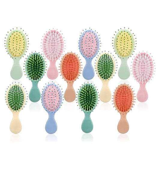 colors.jpg
Assorted colorful mini detangling hair brushes in pink, blue, green, yellow and coral.