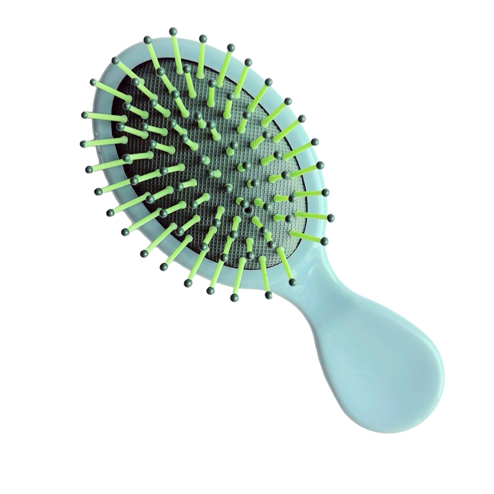 Blue and green mini detangling hair brush, a fun self-care addition to a wellness gift bundle