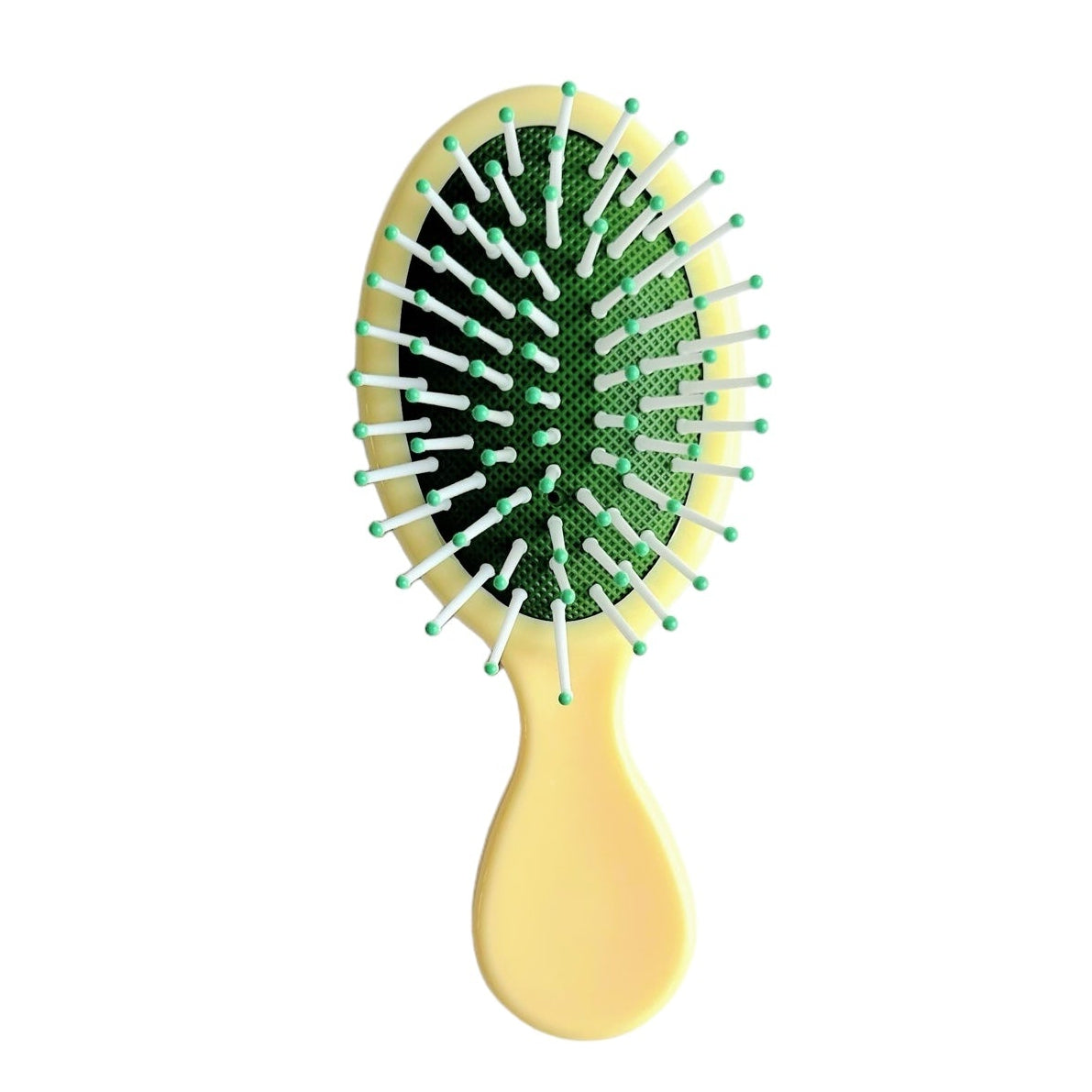 Yellow and green mini detangling hair brush, perfect for adding to a custom wellness gift bundle.