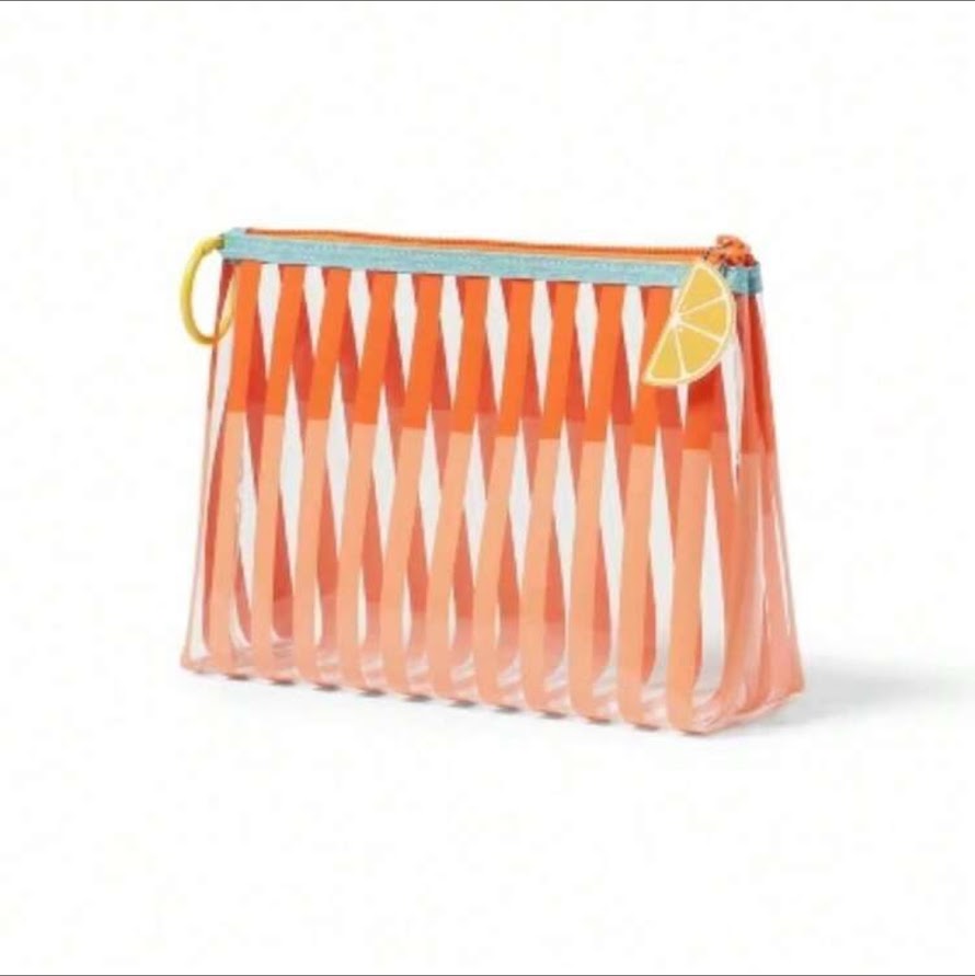 Coral and orange striped reusable gift bag included with the Orange Citrus Wellness Gift Bundle