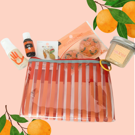 Orange Citrus Wellness Gift Bundle with citrus-inspired self-care products and reusable striped gift bag