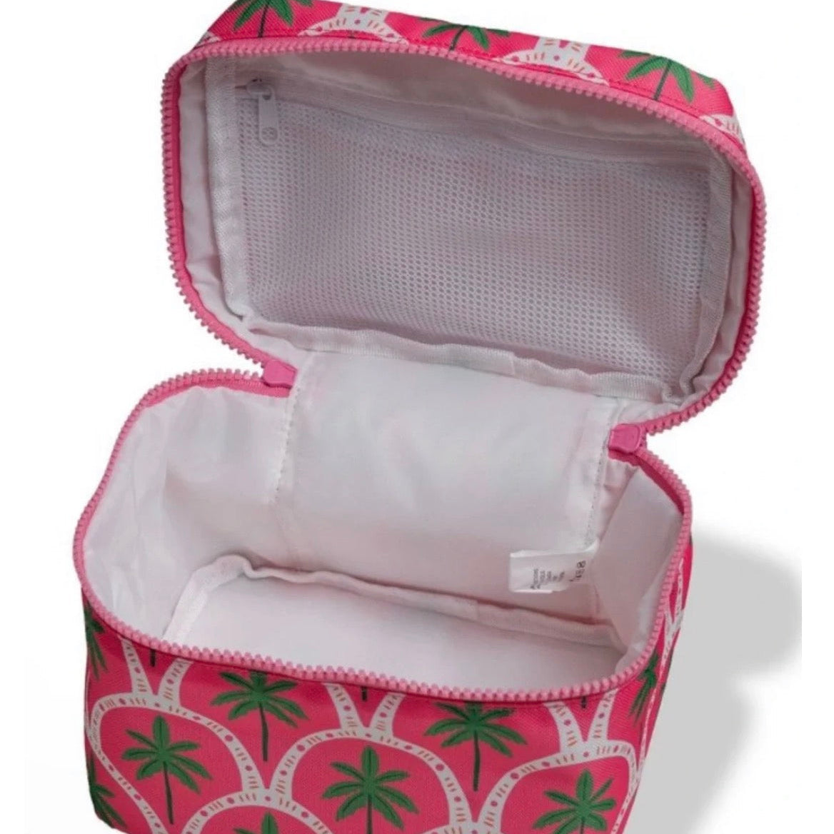 Open pink palm cosmetic case showing roomy lined interior and zippered mesh pocket