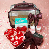 Seasonal wellness gift box for her with plant-powered skincare and essential oil blends