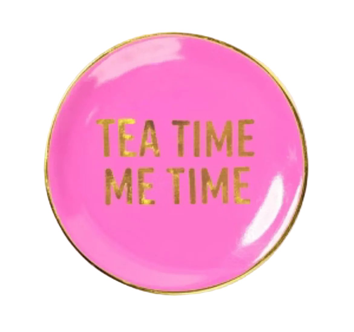 A round pink enamel pin or badge with a gold border and the text 'TEA TIME ME TIME' in gold foil lettering, shown on a white background.