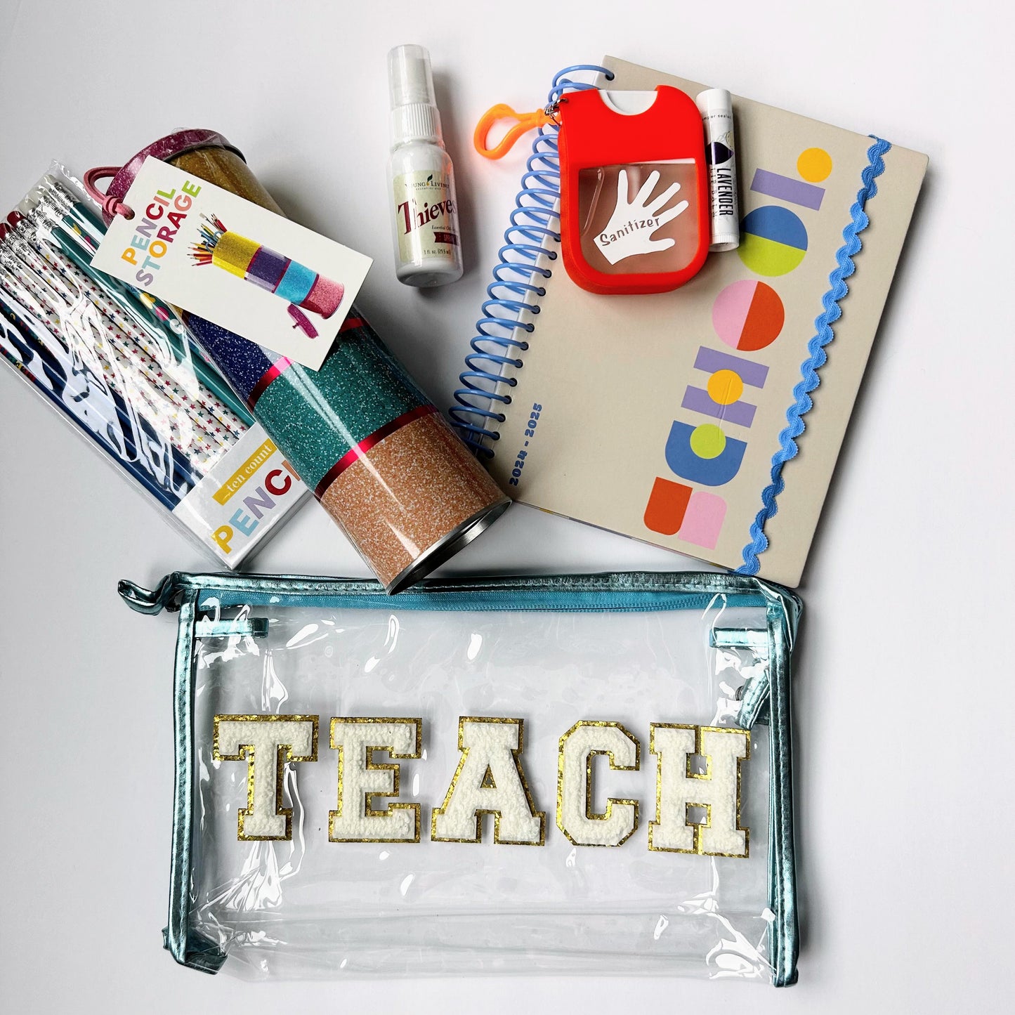 Teacher Wellness Gift Bundle with teal TEACH bag, notebook, classroom supplies and wellness items