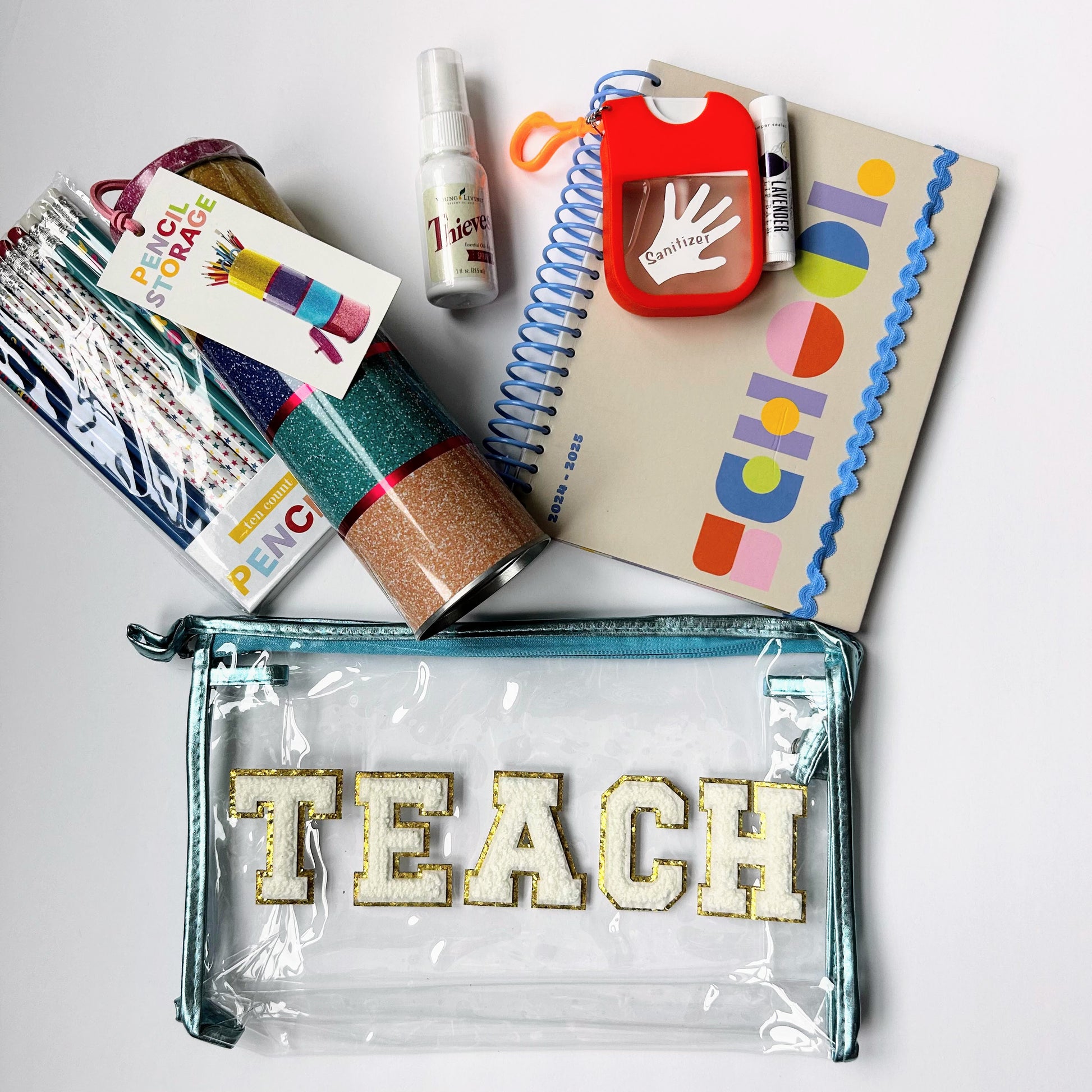 Teacher Wellness Gift Bundle with teal TEACH bag, notebook, classroom supplies and wellness items