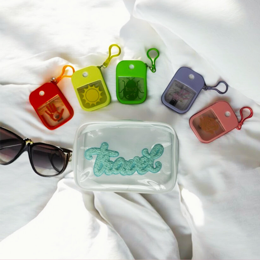 Travel Wellness Starter Kit featuring five refillable travel wellness sprays for vacations, beach days, cruises, road trips, and everyday wellness on the go.