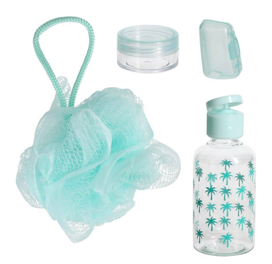 Travel toiletry set with palm tree bottle, mint bath sponge, mini jar, and travel accessories.
