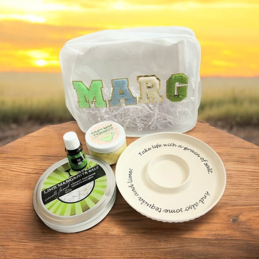 Marg Wellness Gift Bundle featuring a margarita-inspired gift set with citrus margarita salt, body scrub, lime essential oil, salt rimmer, and reusable gift pouch.
