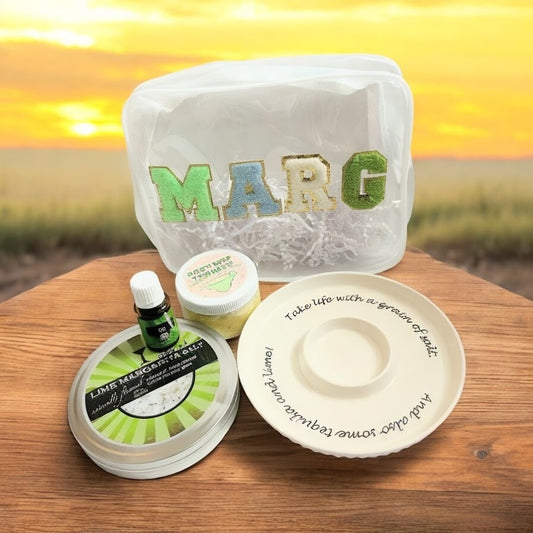 Marg Wellness Gift Bundle featuring a margarita-inspired gift set with citrus margarita salt, body scrub, lime essential oil, salt rimmer, and reusable gift pouch.